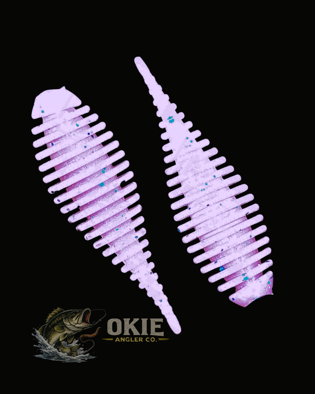 Two light purple soft plastic fishing lures with blue glitter flakes, displayed on a solid black background with the Okie Angler Co. logo at the bottom.