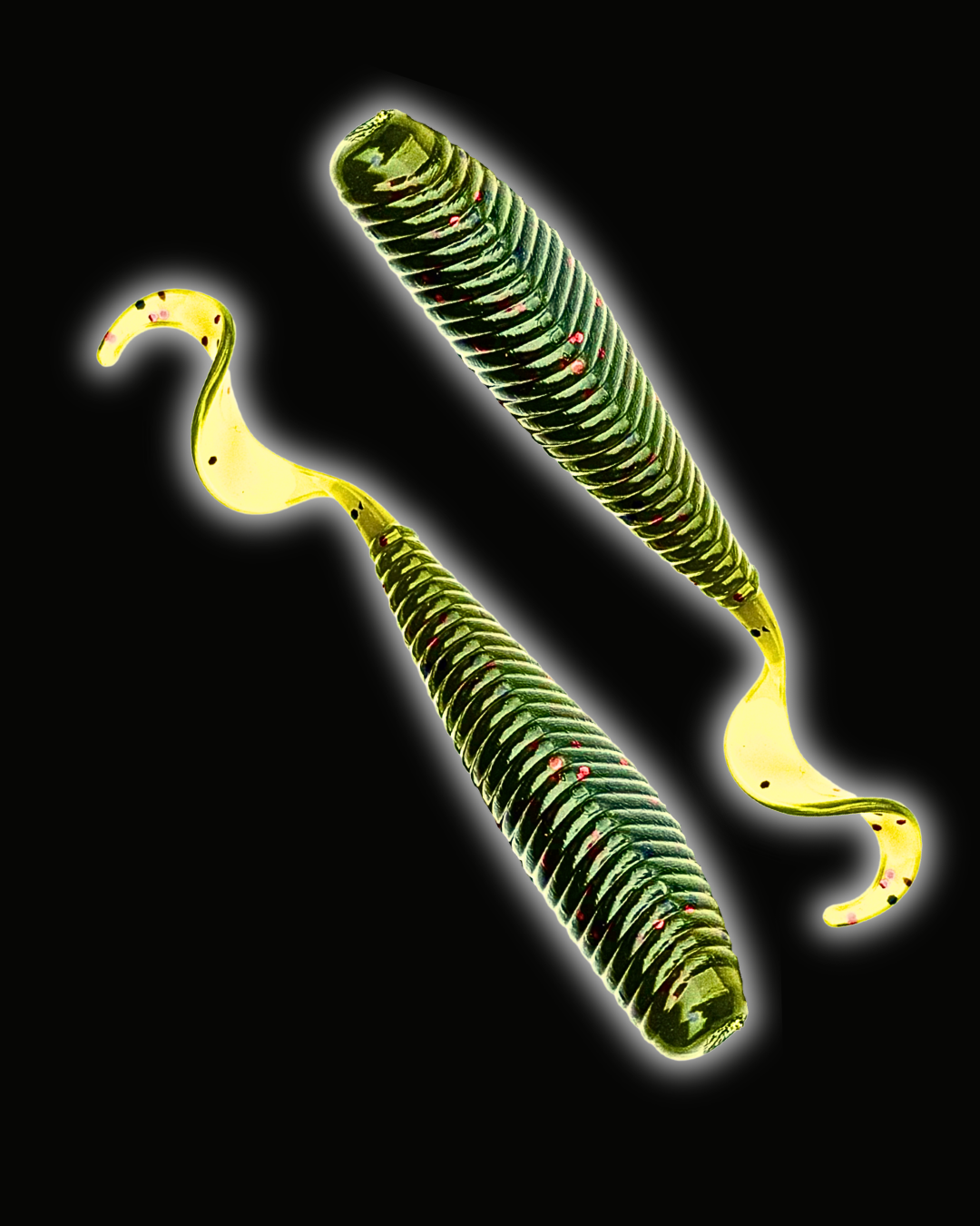 Okie Angler Co Watermelon Red 5" Okie Stud ribbed curl-tail soft plastic fishing lures on a black background.