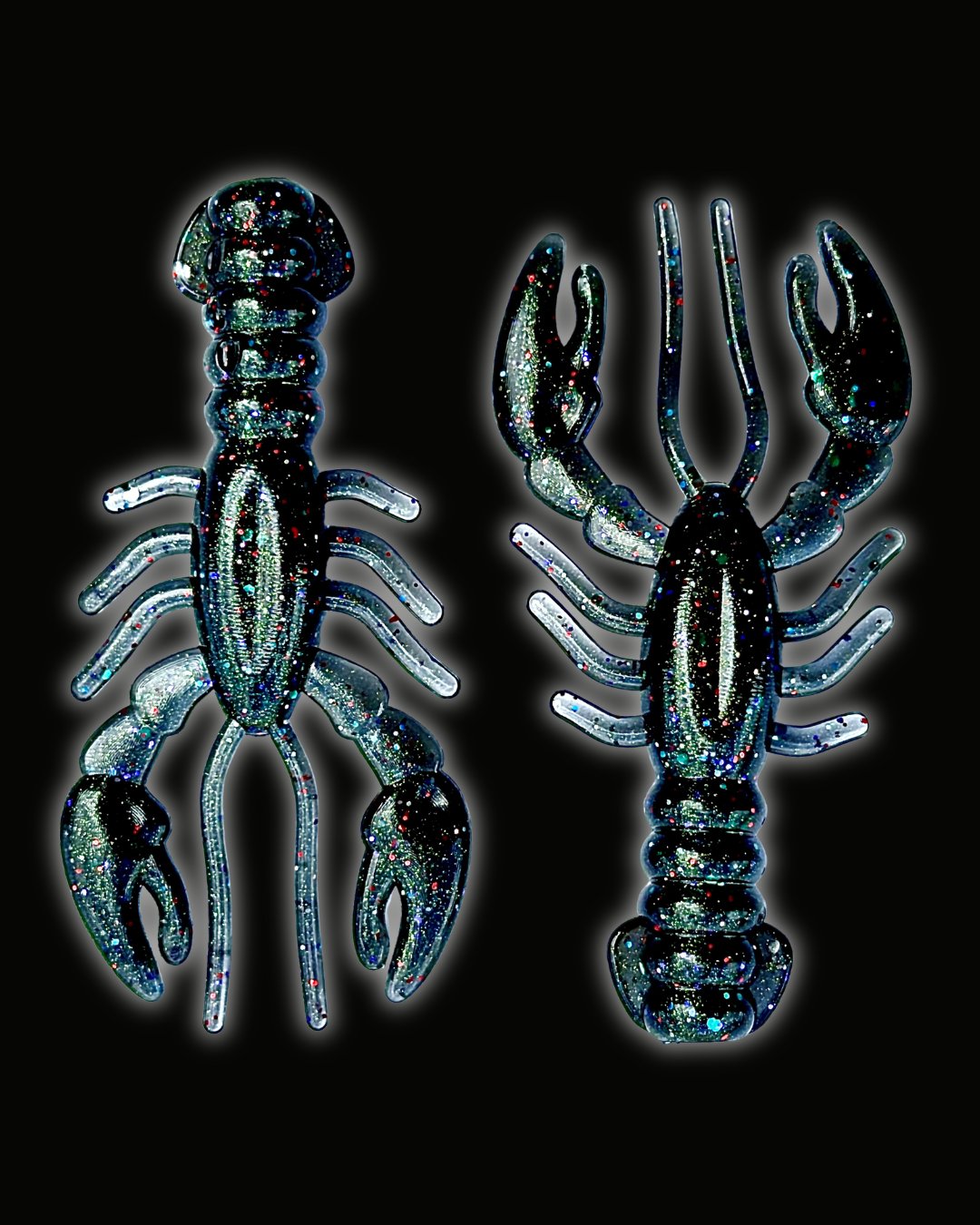 Two Okie Angler Co 3.4" Glory Craws in the color Space Candy (black with multi-colored sparkles) - crawfish-style fishing lures on a black background.