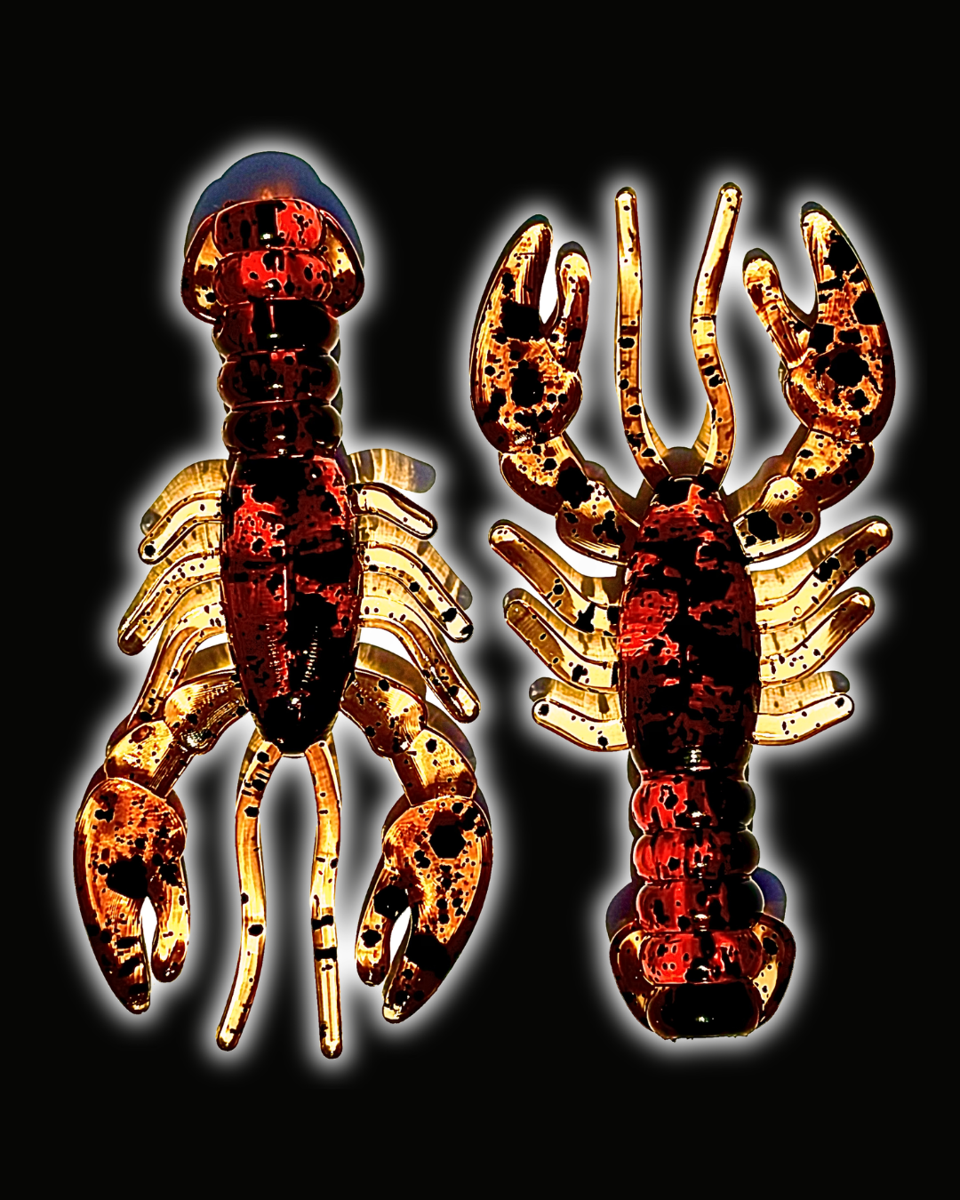 Two Okie Angler Co 3.4" Glory Craws in the color Sweet Fire - crawfish-style fishing lures on a black background.