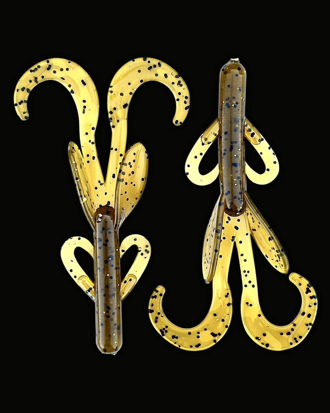 Two Okie Angler Co 3.8" Green Pumpkin Salted Mud Hogs - brush-hog style baits for bass fishing on a black background.