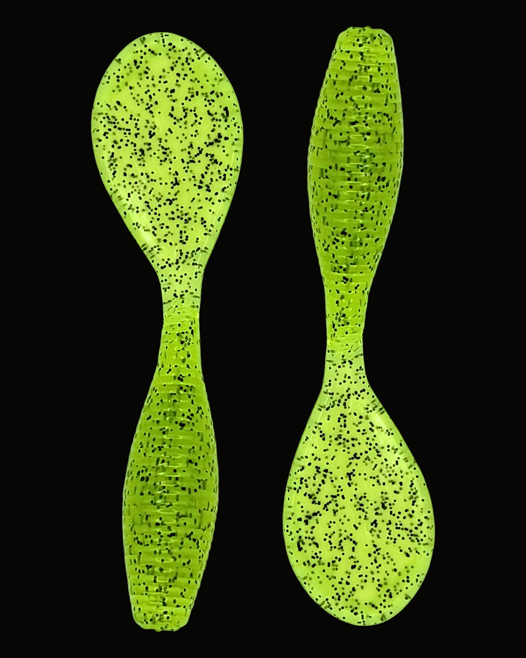 Okie Angler Co Chartreuse Pepper 4" Paddle Grub ribbed, paddle-tail soft plastic fishing lures on a black background.