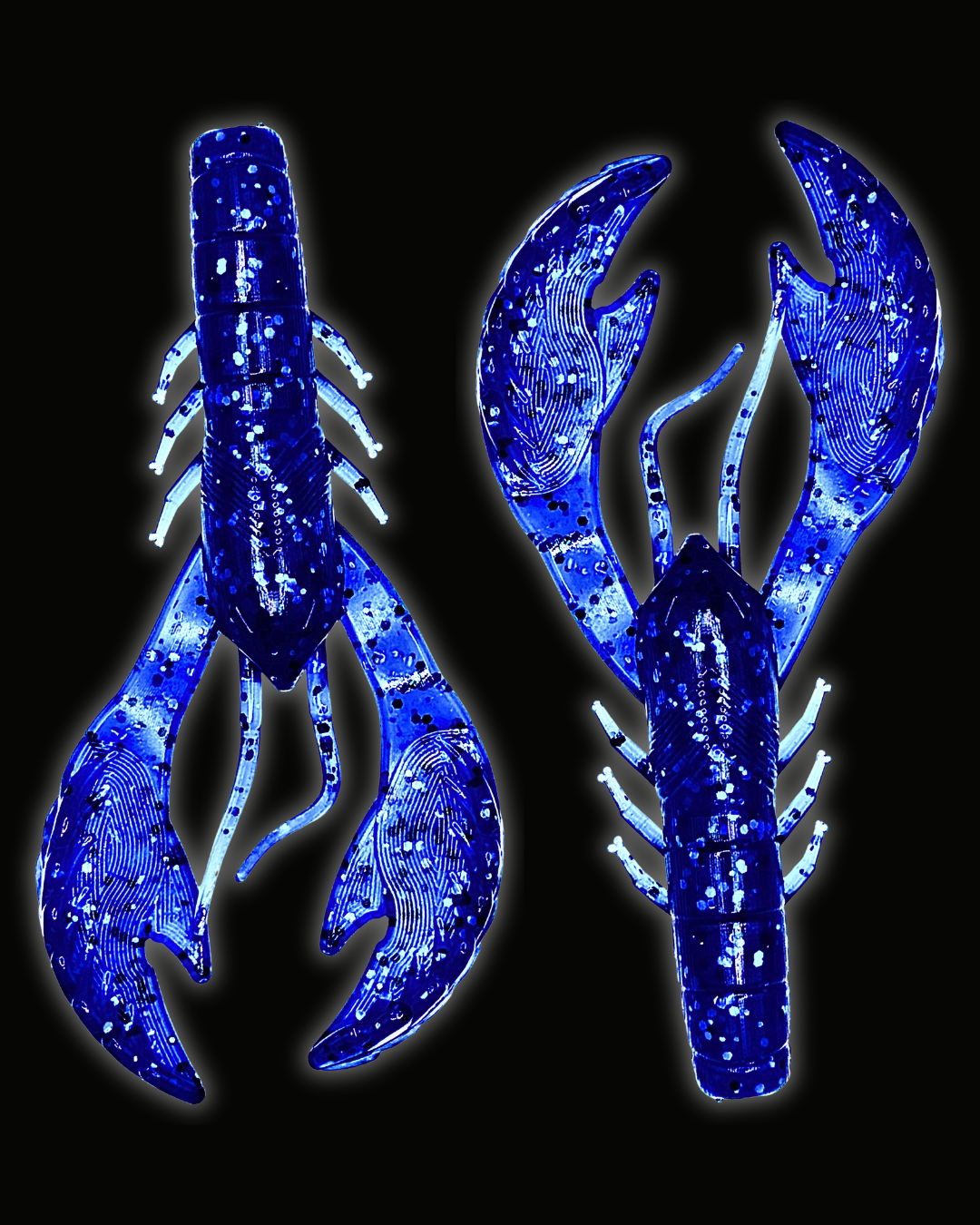 Two Okie Angler Co 4" Okie Craws in the color Nightfall Blue - crawfish-style bass fishing lures on a black background.