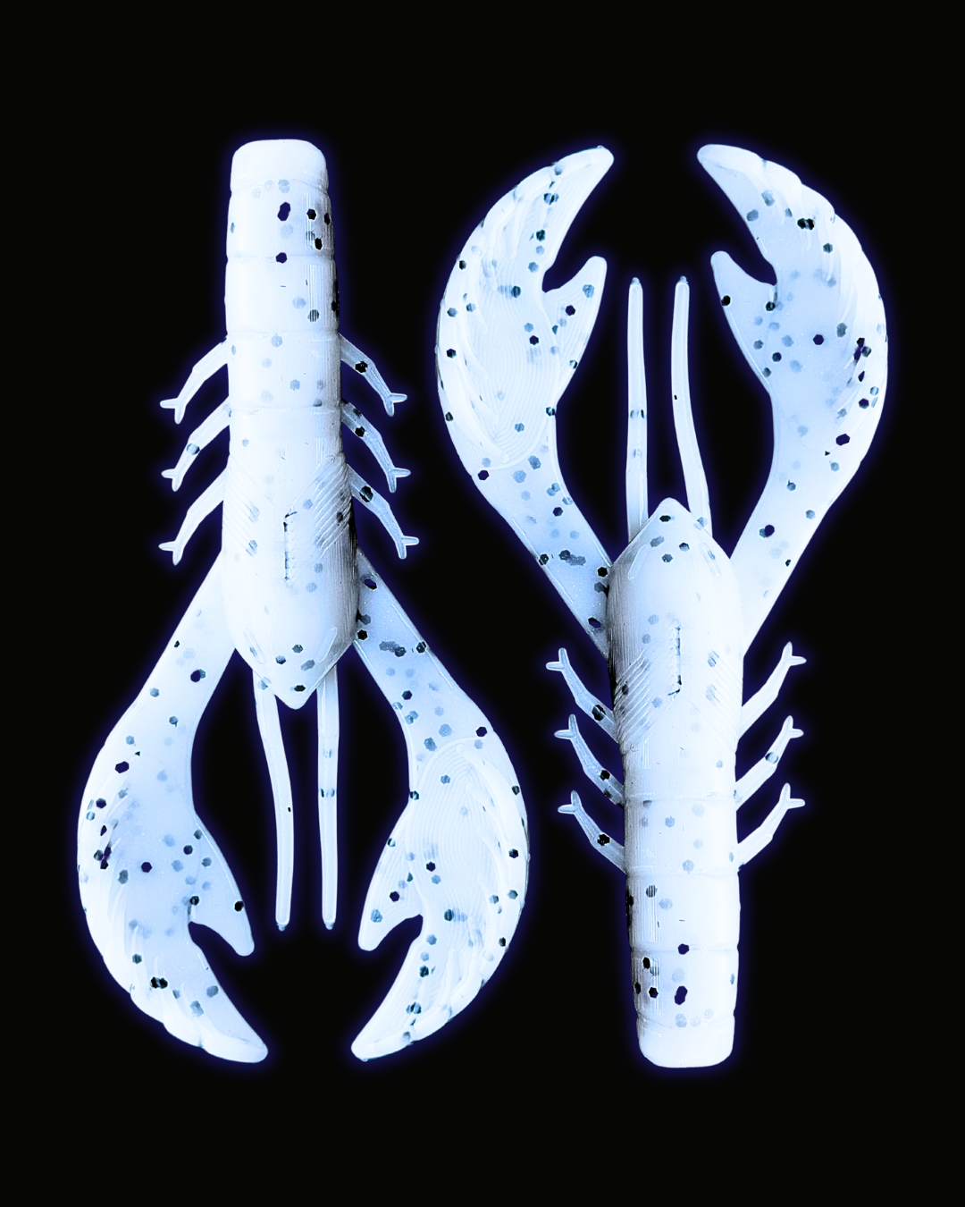 Two Okie Angler Co 4" Okie Craws in the color Salt and Pepper - crawfish-style bass fishing lures on a black background.