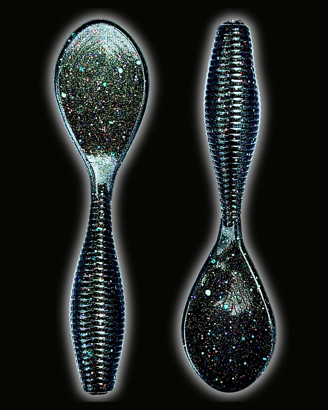 Okie Angler Co Space Candy 4" Paddle Grub ribbed, paddle-tail soft plastic fishing lures on a black background.