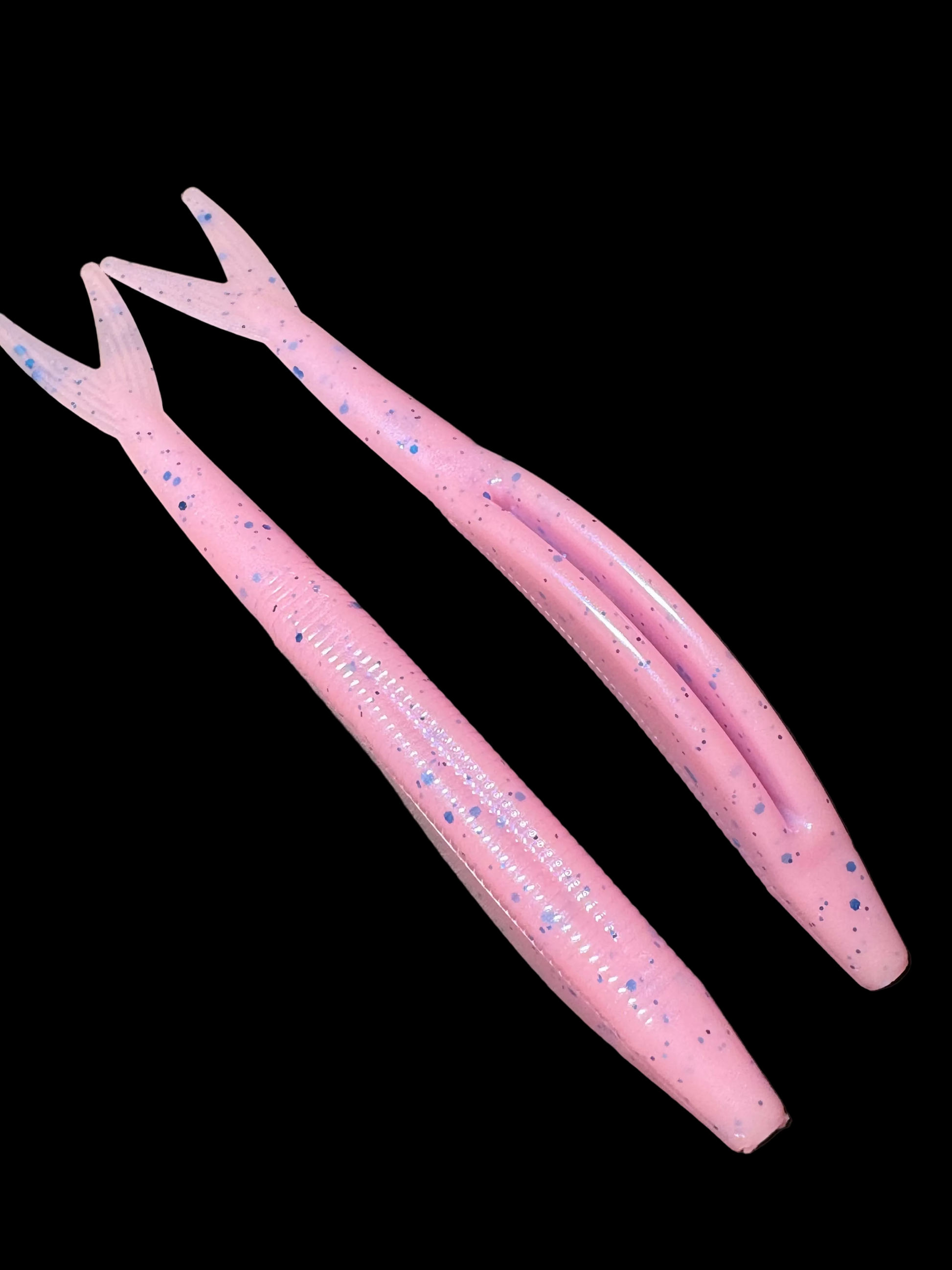 Okie Angler Co Pink Berry 5" jerk bait soft plastic fishing lures on a black background.