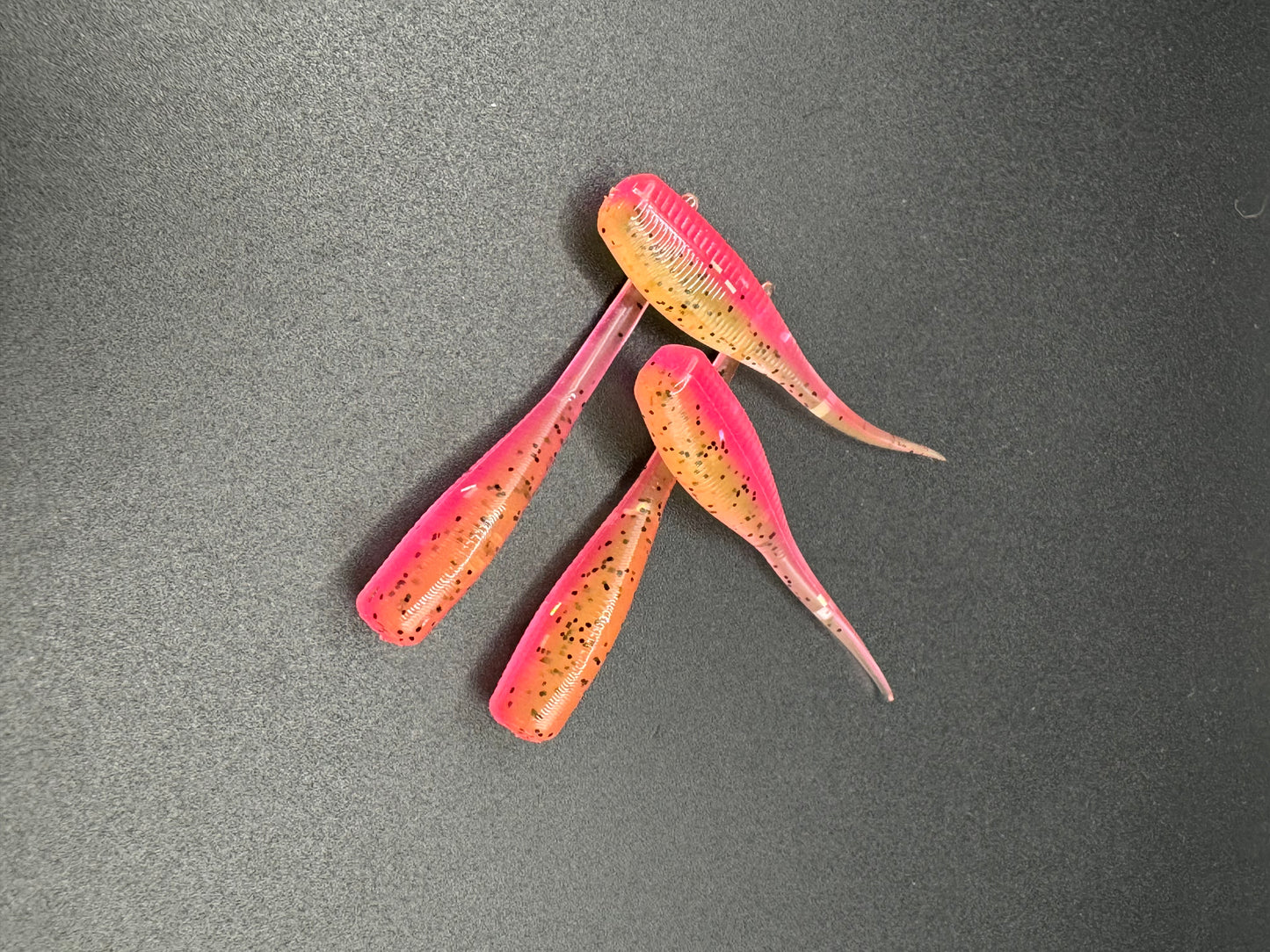 Okie Angler co Pink lemonade 2 inch crappie  bait soft plastic lure for pan fishing.