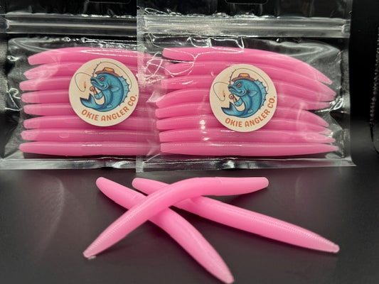 Okie Angler Co 5" Bubblegum Twister Stick Senko-style stick bait for bass fishing on a black background.